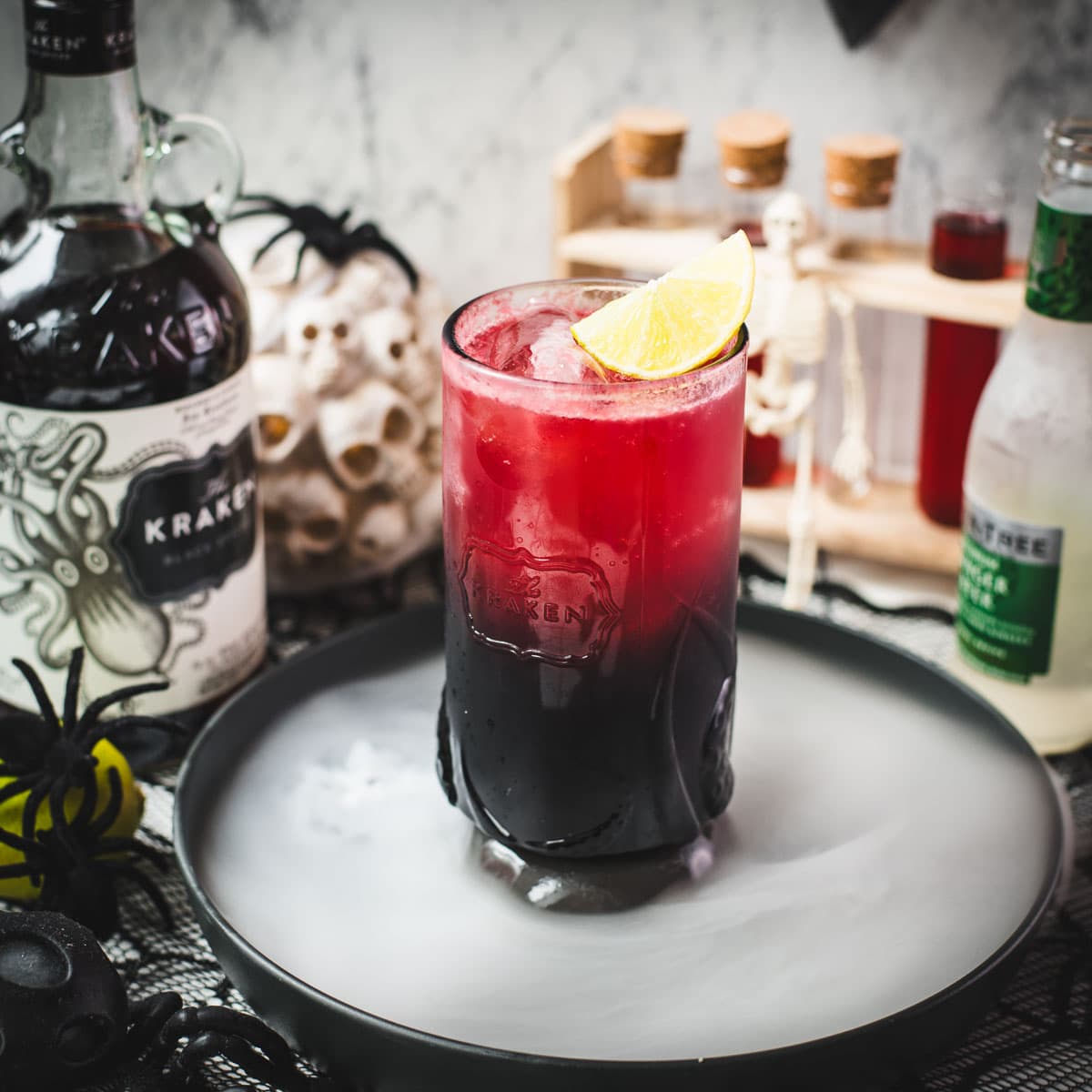 Spooky crimson kraken cocktail with ginger beer and homemade blood syrup.