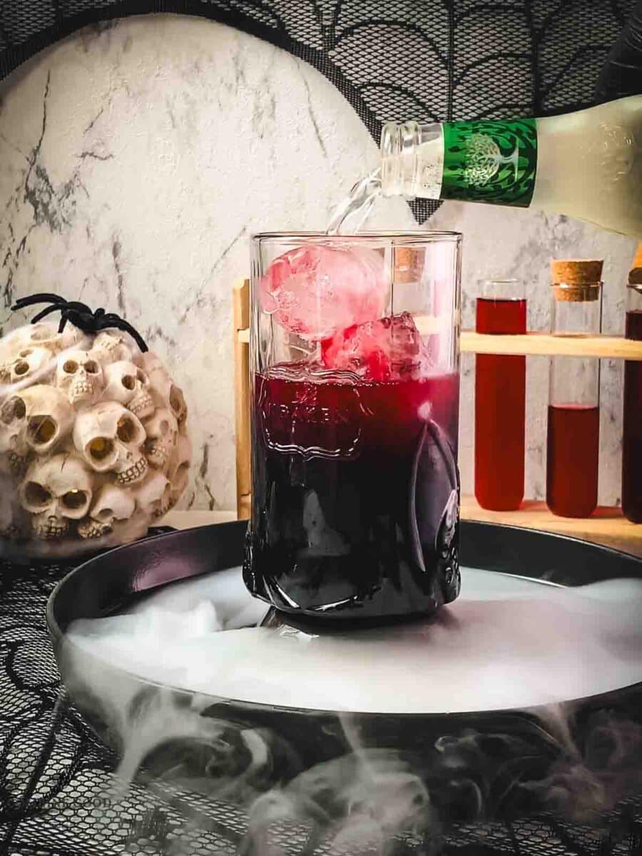 Top with ginger beer.