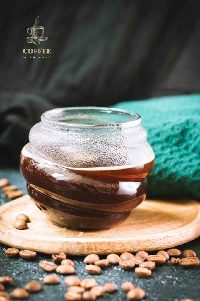 Gorgeous glass, filled with an hot Americano coffee.