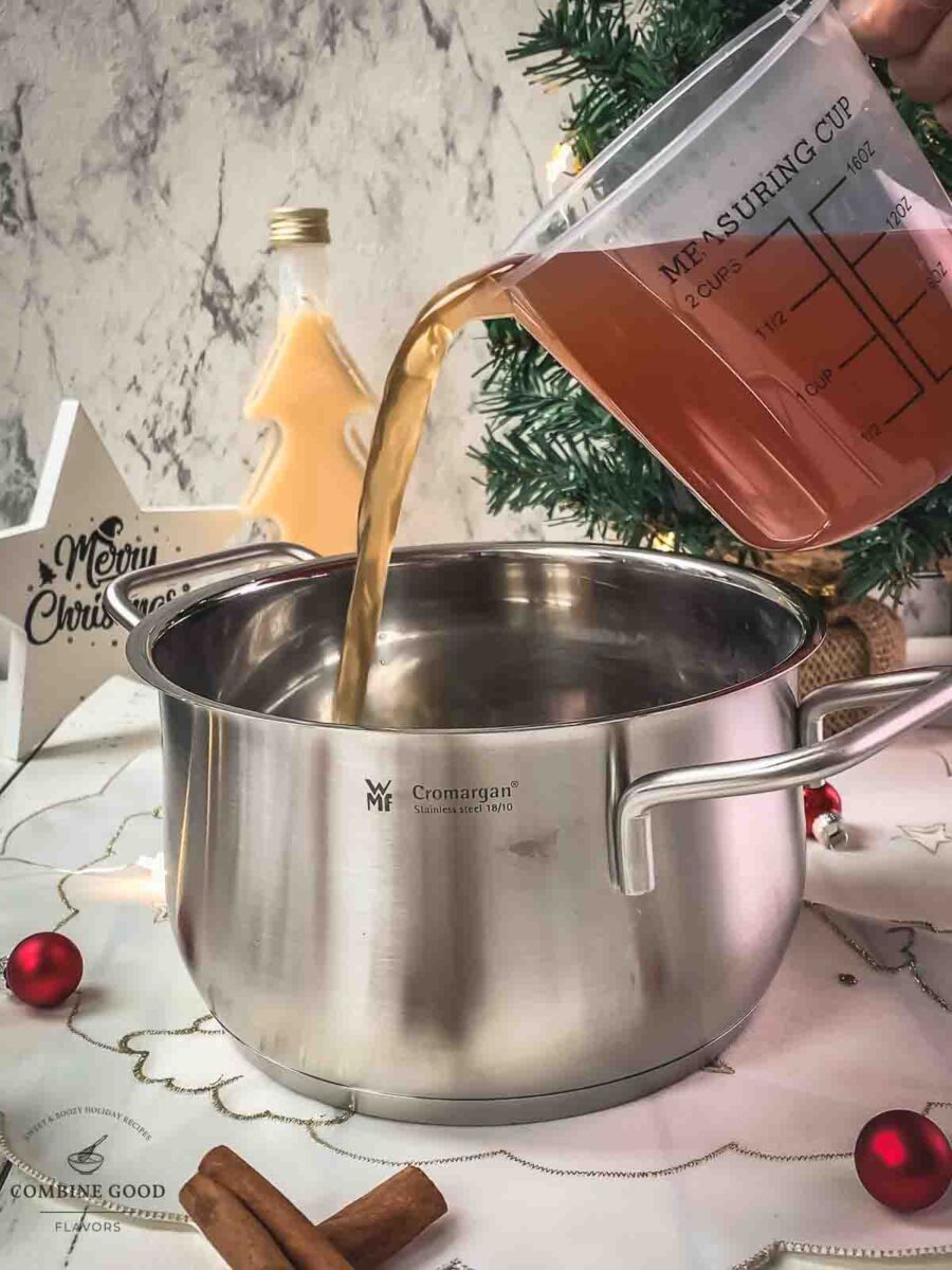 Pour (hot) cider into a saucepan.