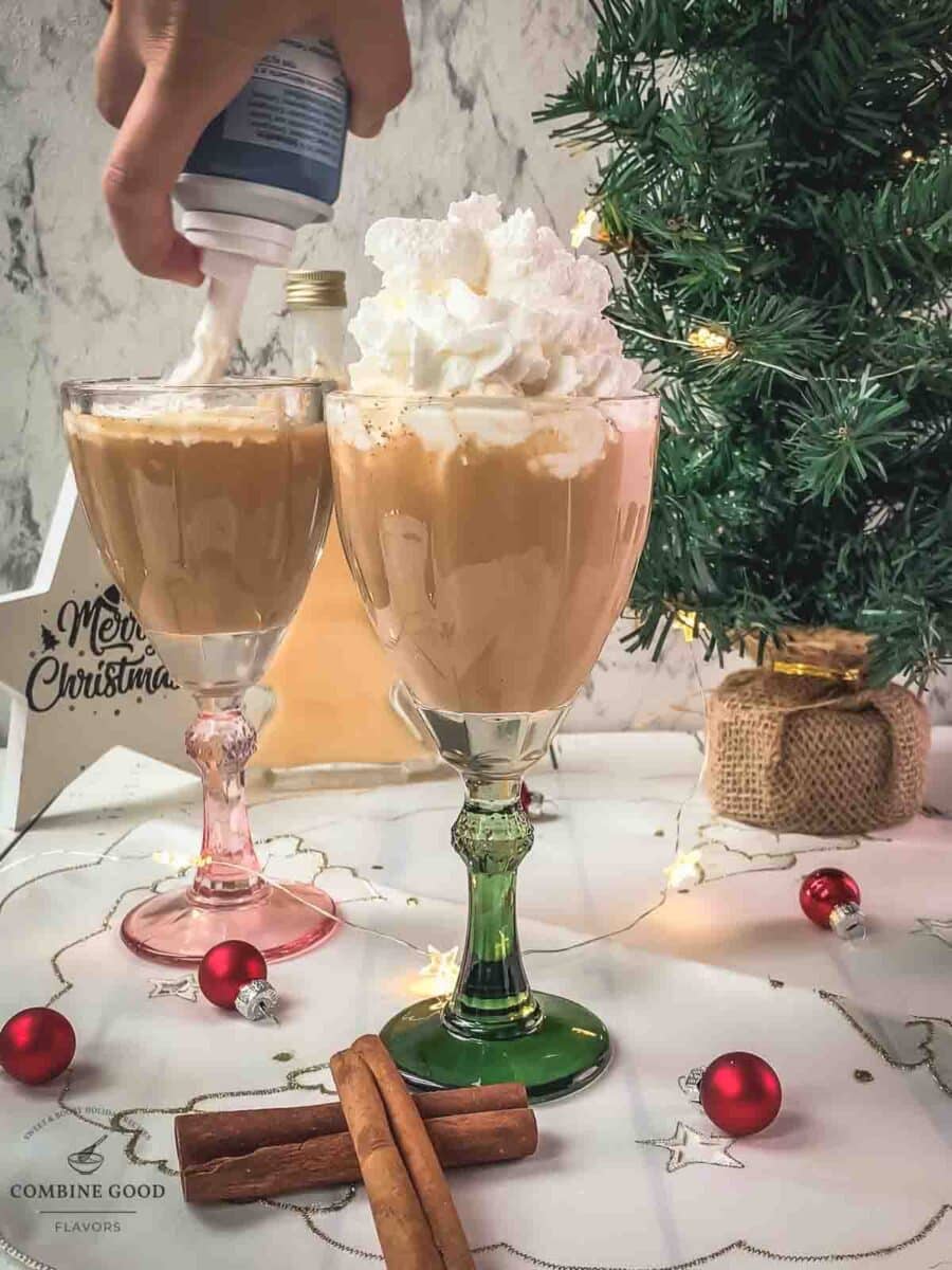 Top the spiced apple cider with whipped cream.