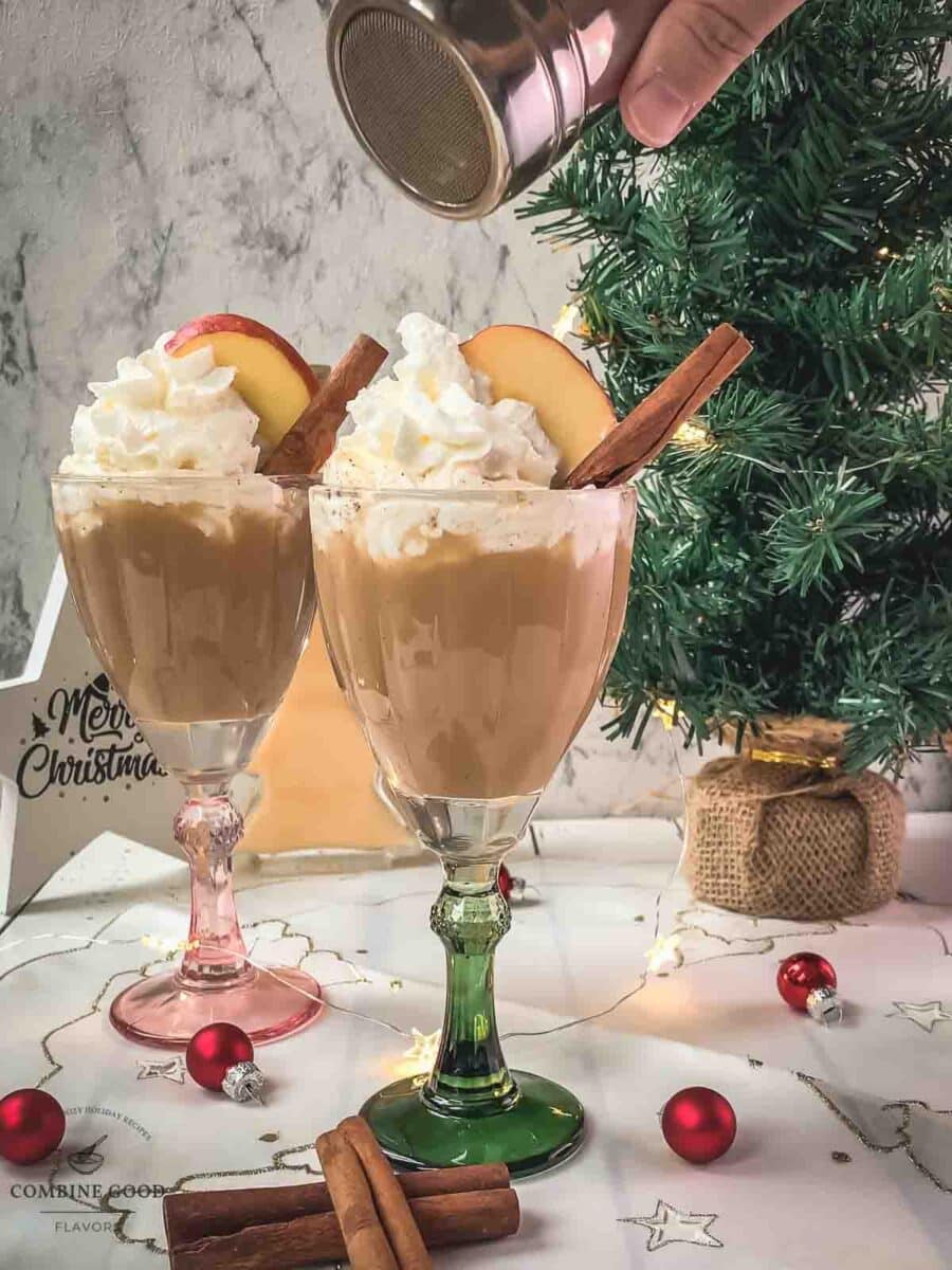 Dust the spiced apple cider with ground cinnamon.