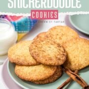 Fluffy snickerdoodle cookies placed on multicolored plates.