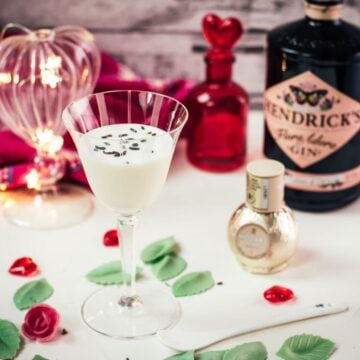 Elegant Gin Alexander, garnished with lavender buds. Perfect for Valentine's Day!
