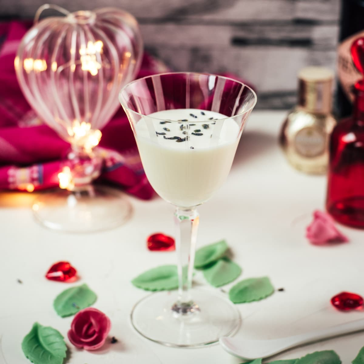 Elegant Gin Alexander, garnished with lavender buds. Perfect for Valentine's Day!