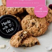 Raspberry macadamia oatmeal white chocolate chip cookies placed on white plate.