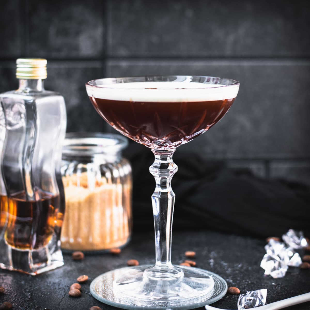 Brown sugar espresso martini placed on mirrored coaster.