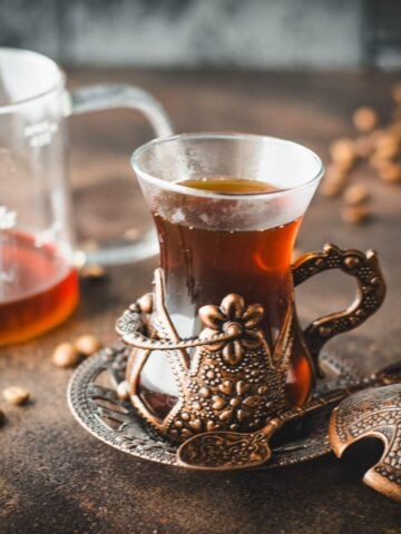 Gorgeous medieval glass filled with delicious pour over coffee, made with a Kalita wave.