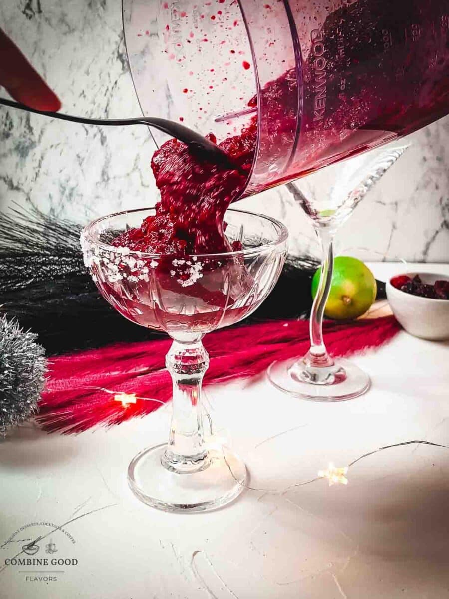 Pour the finished frozen berry mix margarita into your serving glass.