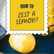 Zested lemon next to a lemon zester and a bowl full of lemons.
