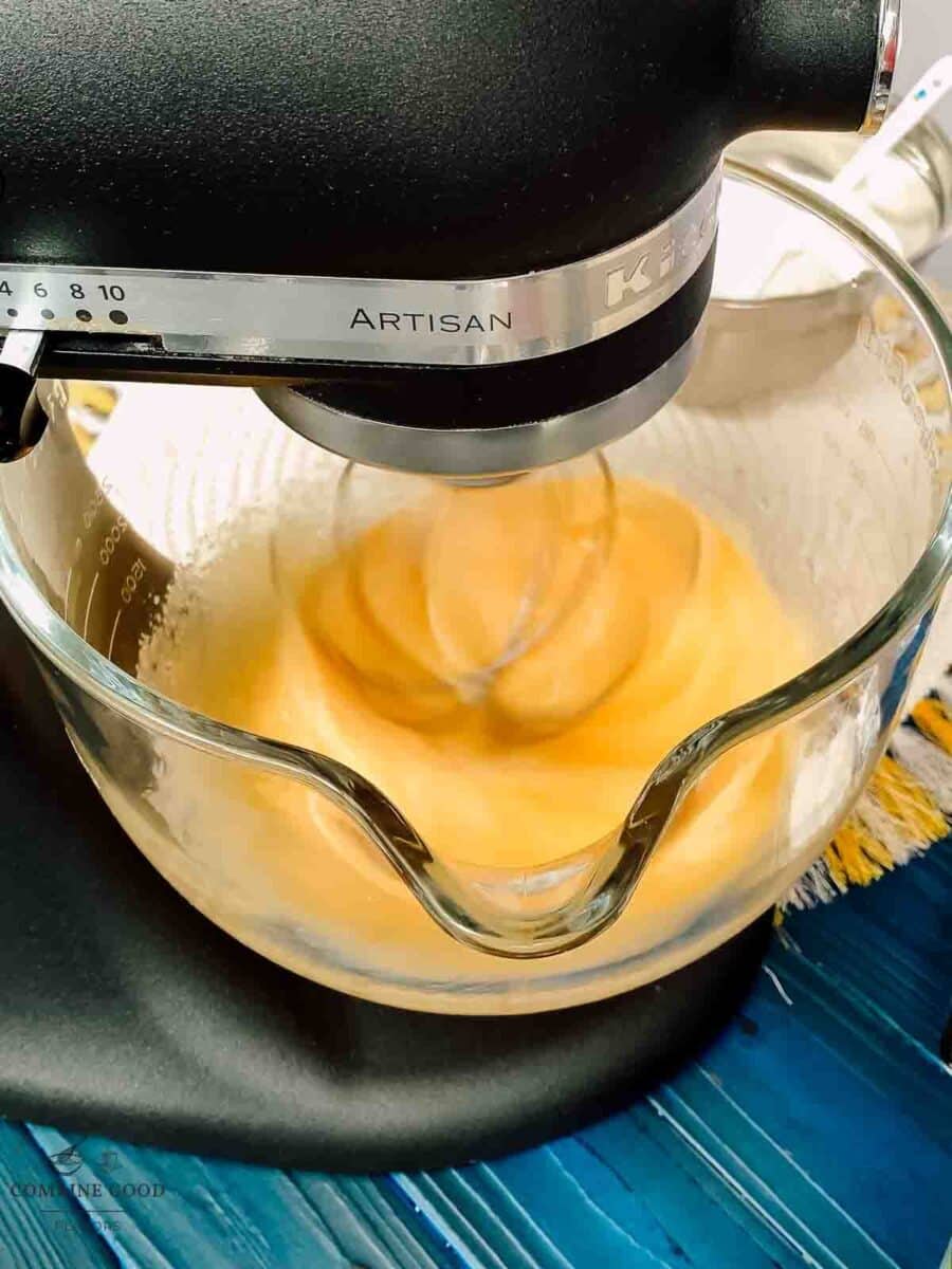 Whisking the eggs with the granulated sugar.