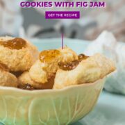 Delicious fig jam cookies, placed in a yellow bowl, on cookie is already missing a bite.