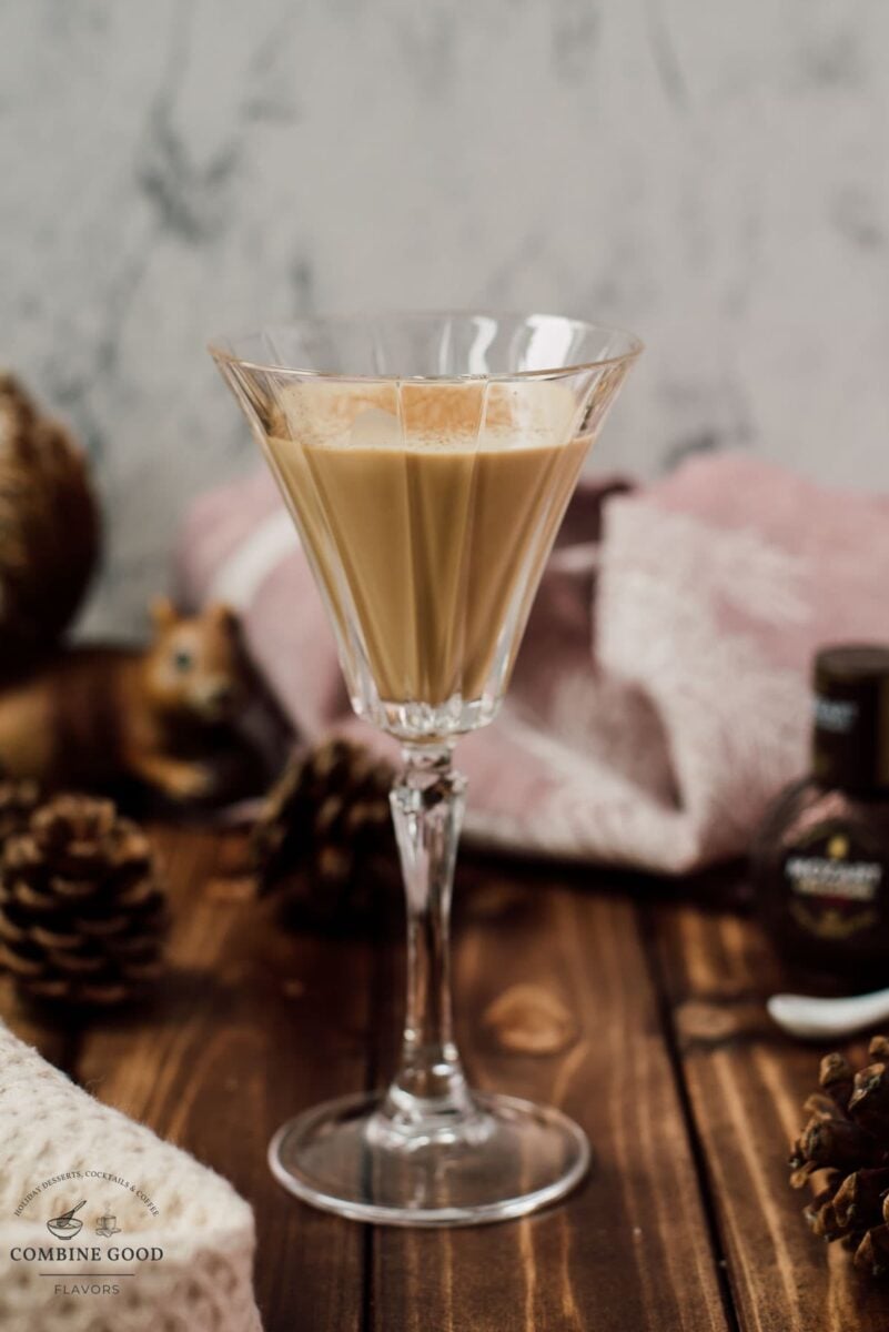 Dark chocolate Brandy Alexander beside a bottle of Mozart Dark Chocolate Liqueur