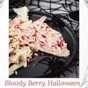 Stunning and elegant - this Halloween bark, made with crushed raspberries, white chocolate, and berry blood syrup is to die for!