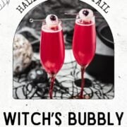 Spooky red Halloween cocktails, garnished with lychee eyeballs and served in a spooky location.