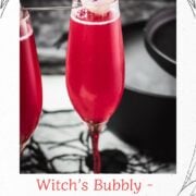 Spooky red Halloween cocktails, garnished with lychee eyeballs and served in a spooky location.