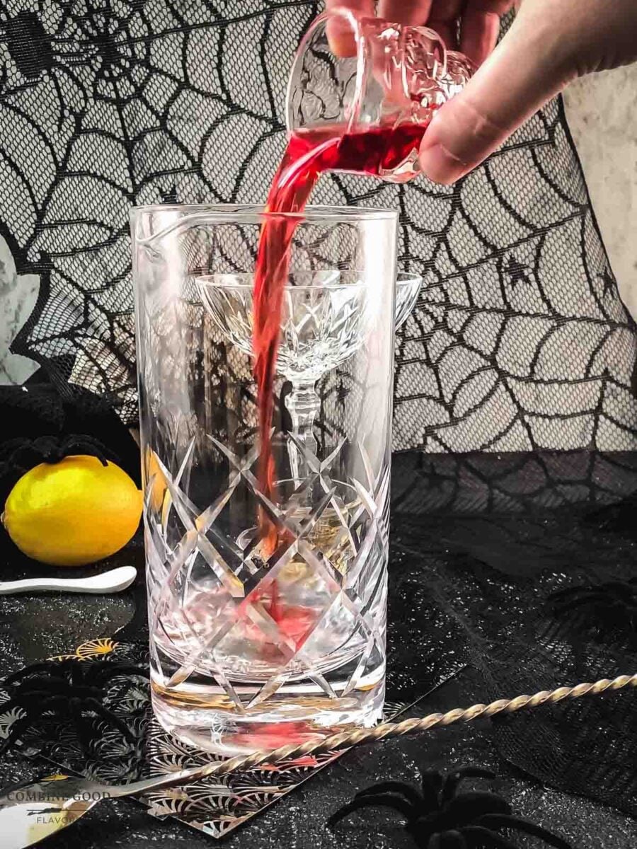 Add Campari to the mixing glass.