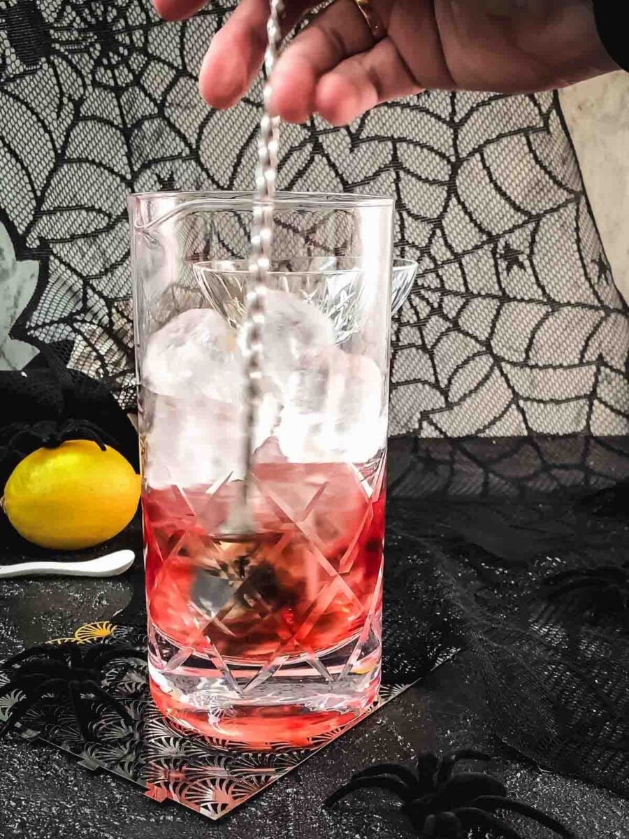 Stir the cocktail gently using a bar spoon and a mixing glass.