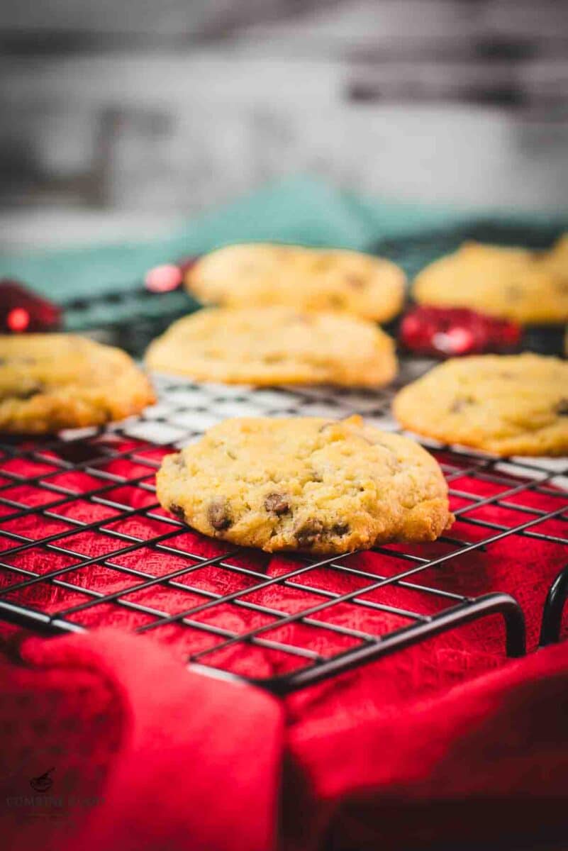Soft chocolate chip pudding cookies arranged on a cooling rack.