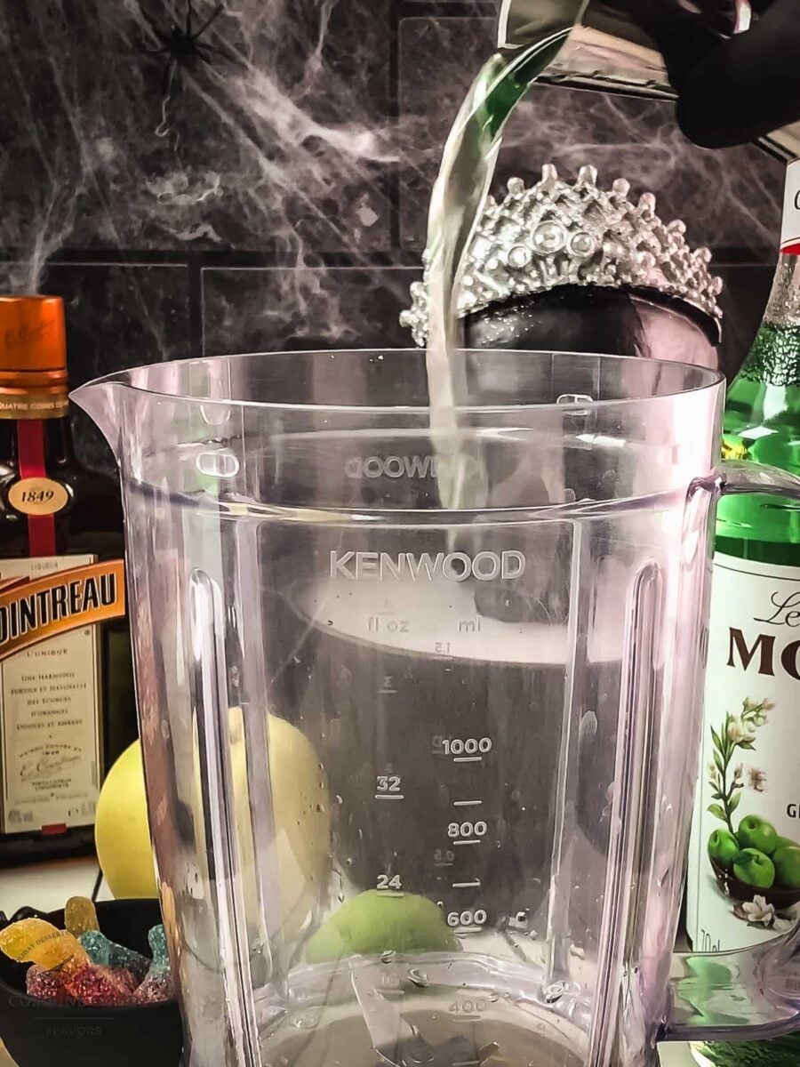 Green apple syrup added to a blender