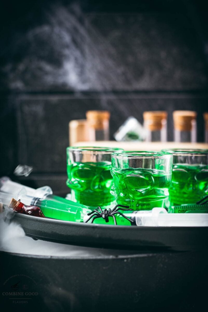 Green Halloween Jello shot syringes and skull shot glasses