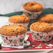 Cute egg yolk cranberry coconut muffins in Christmas styled muffin liners.