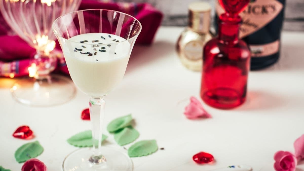 Elegant Gin Alexander, garnished with lavender buds. Perfect for Valentine's Day!