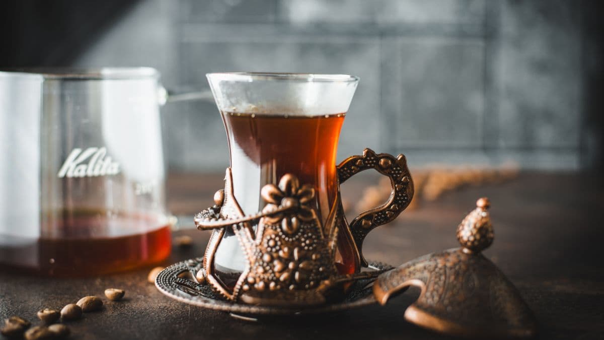Gorgeous medieval glass filled with delicious pour over coffee, made with a Kalita wave.
