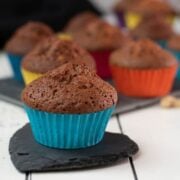 One gorgeous rum muffin placed on heart-shaped black slate coaster.